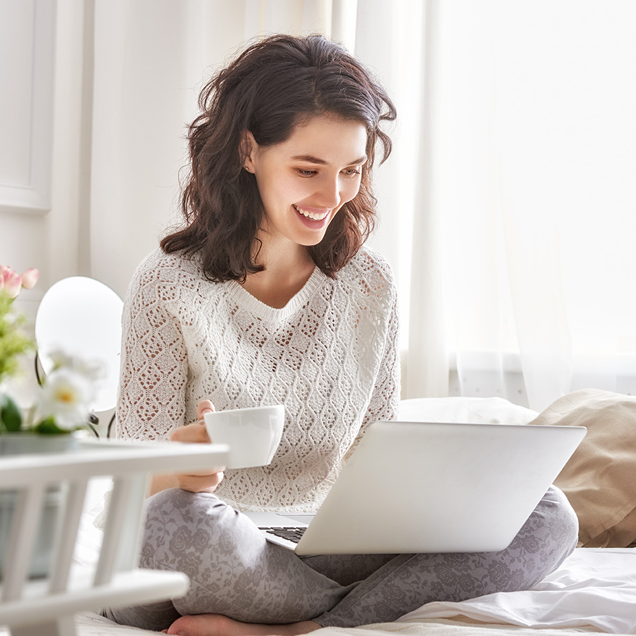 Young woman with a laptop for online individual therapy in Louisiana